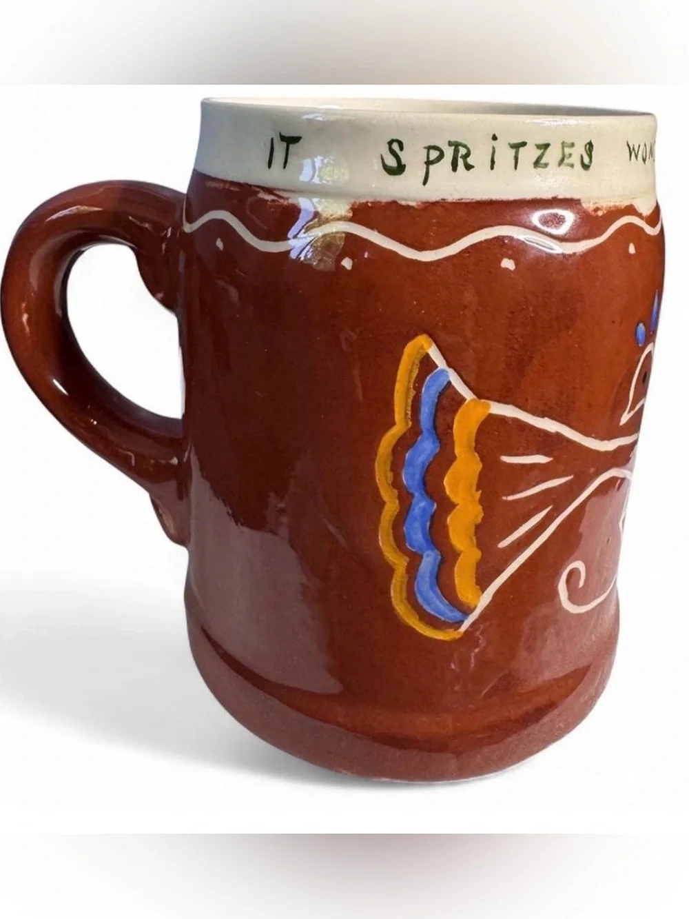 Vintage handmade ceramic mug with a frog inside the cups , peacock, flowers